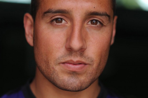 New Arsenal signing Santi Cazorla poses at Arsenal Training Ground